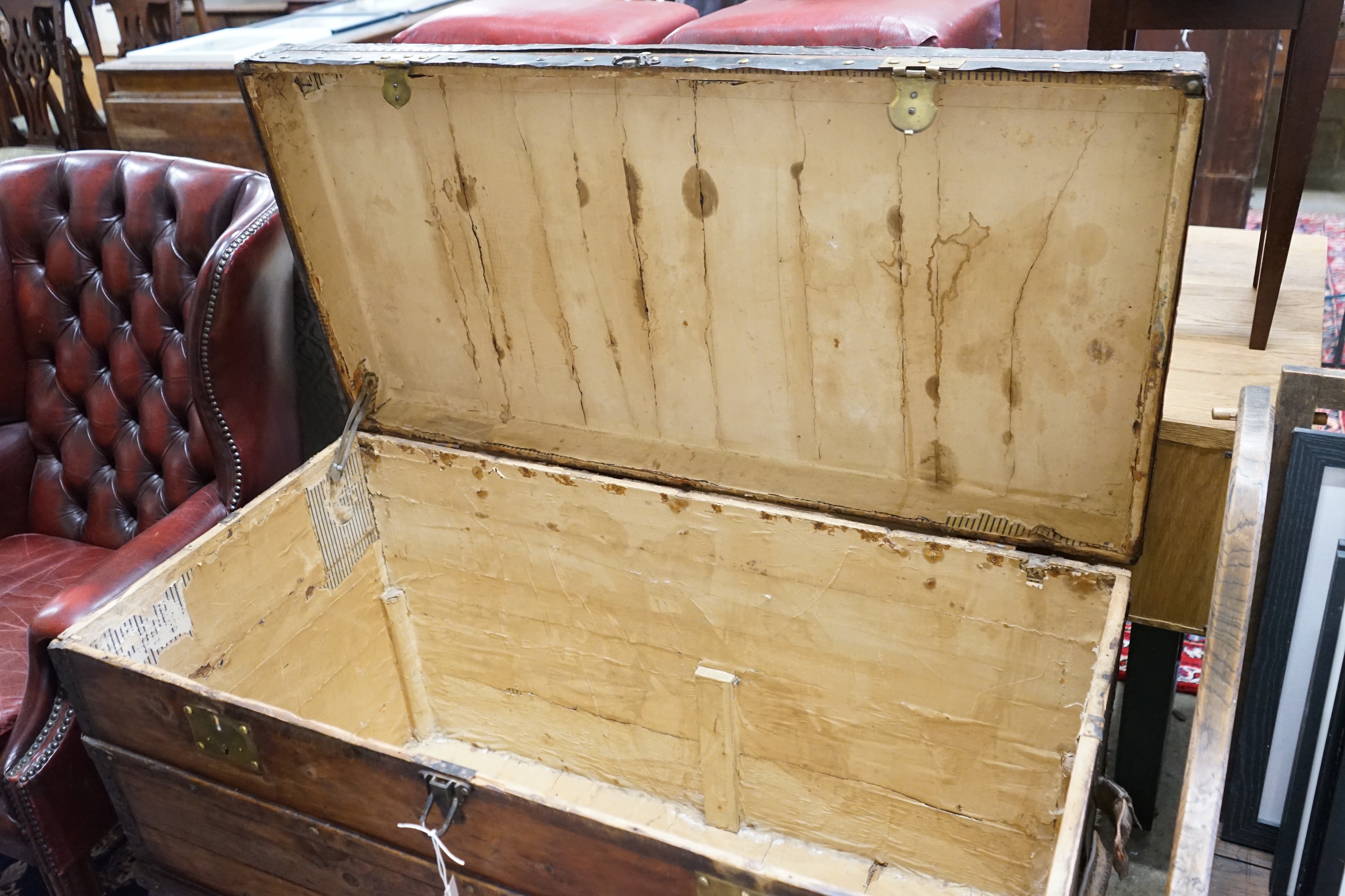 A Victorian iron and brass mounted trunk, length 109cm, depth 54cm, height 70cm